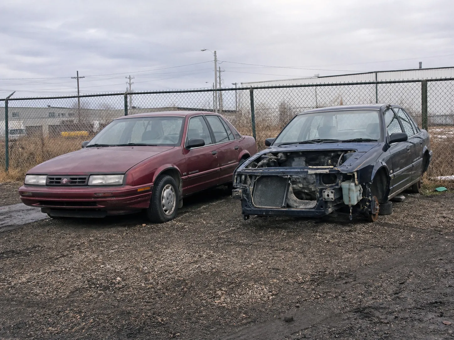 Two similar cars with different levels of parts completeness.